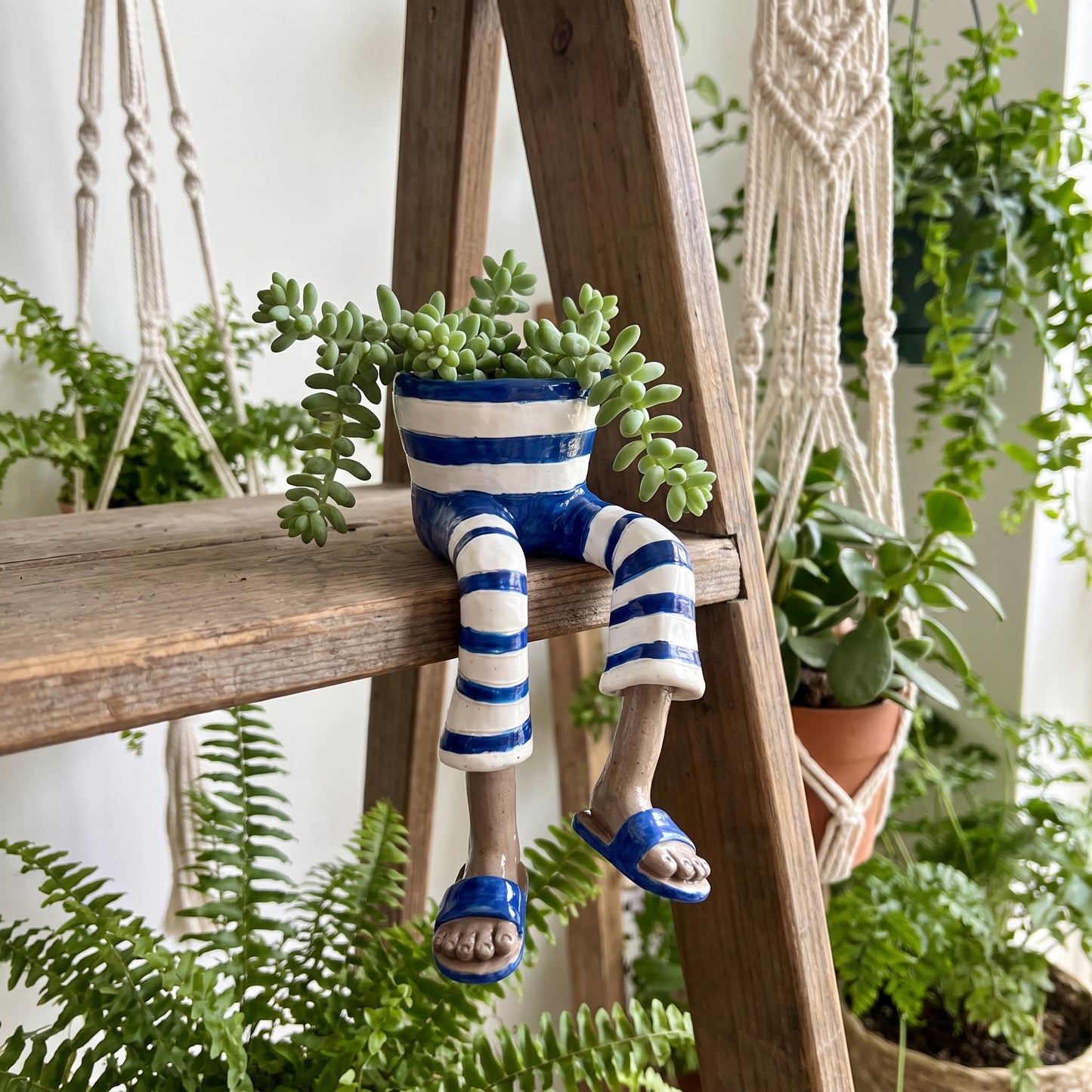 Blue striped legs dangling-legs plant pot