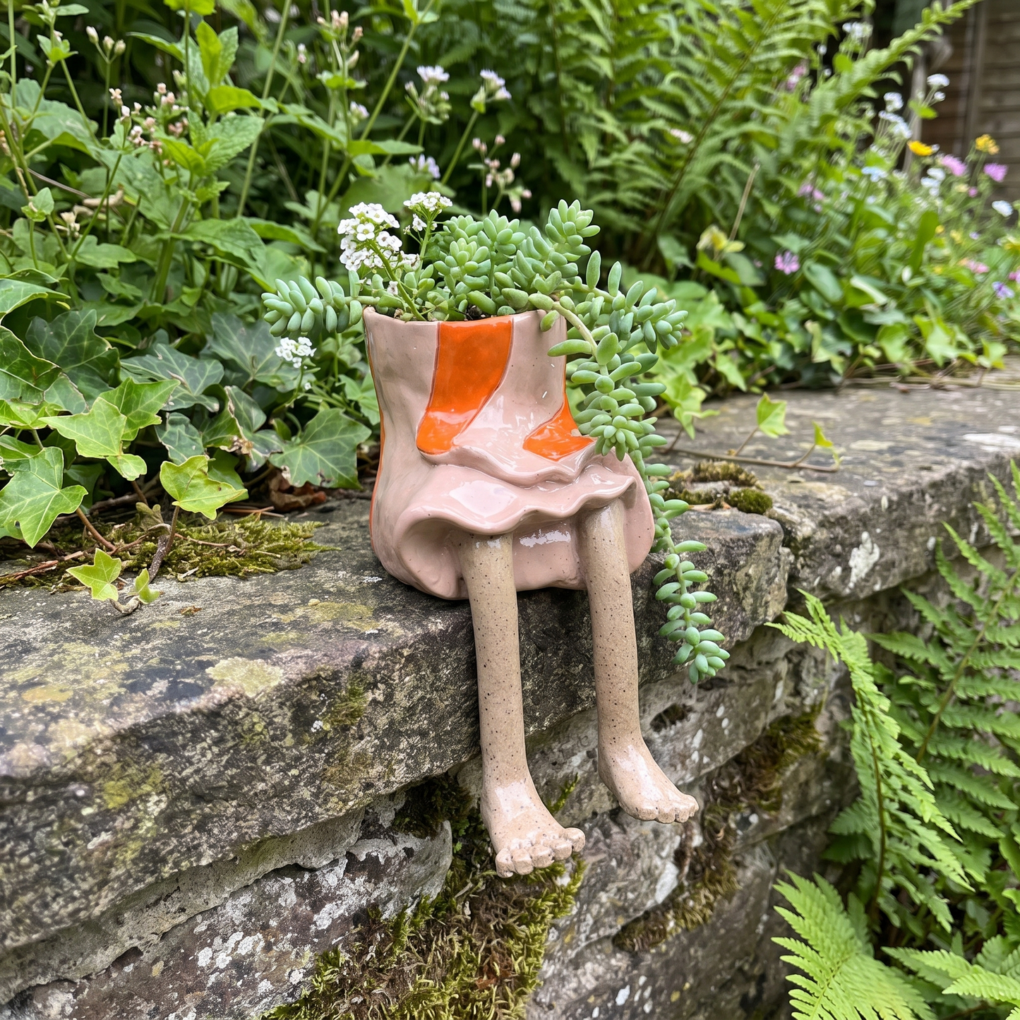 Peach ruffle skirt dangling-legs plant pot